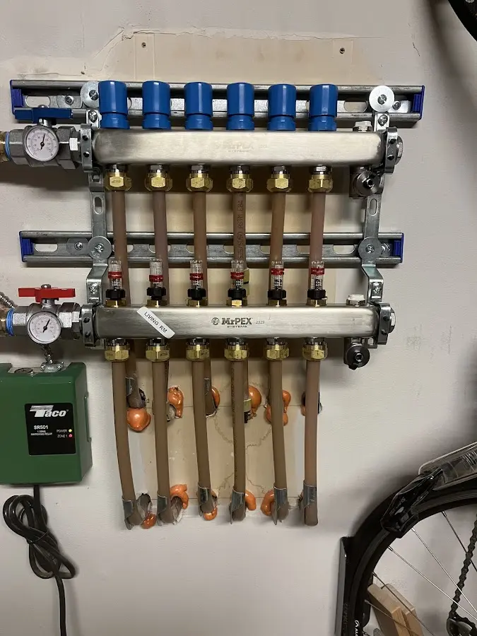 Plumber performing Water Heater Repair at a residential property in Macungie